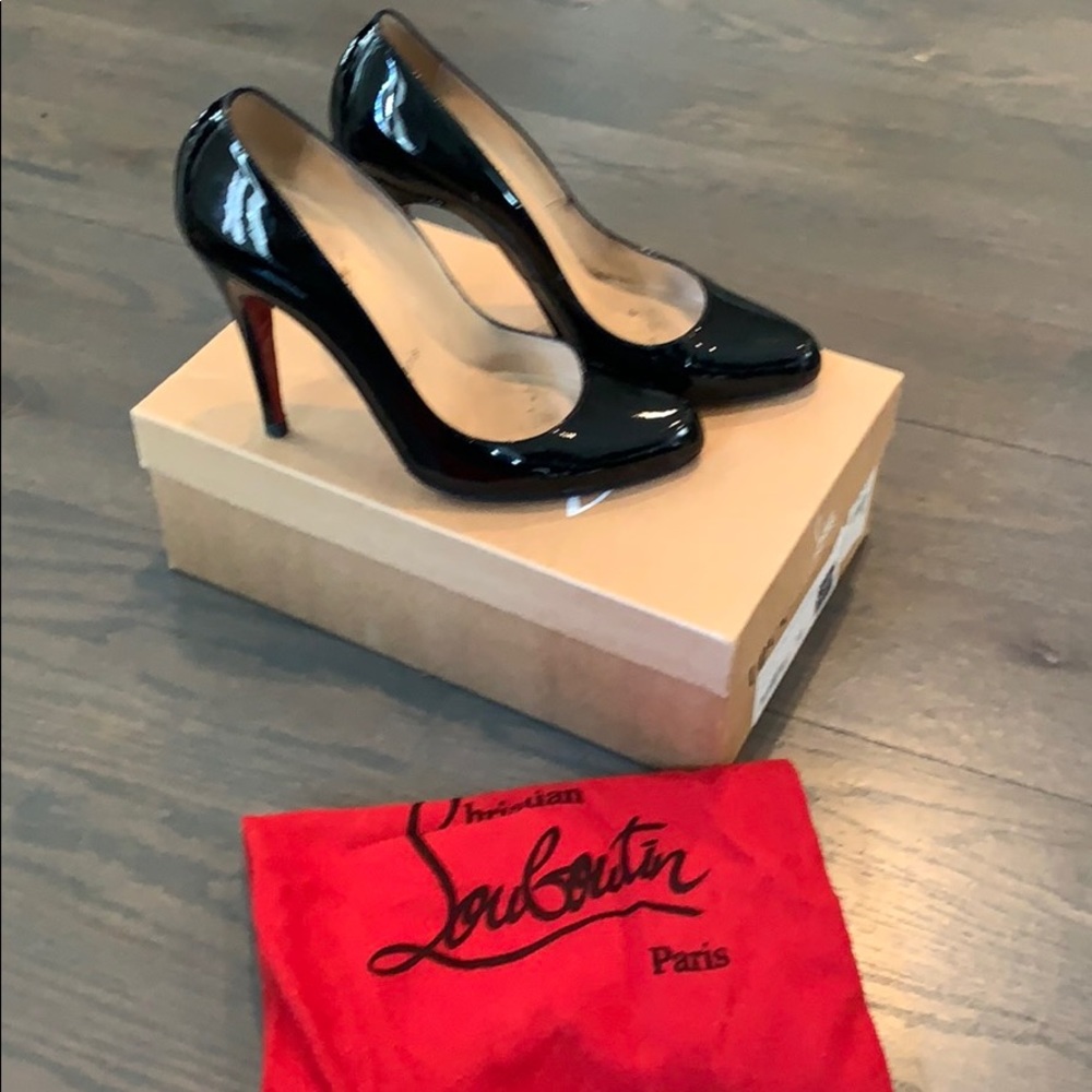 Christian Louboutin Black Patent pumps